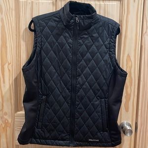 Never worn black vest. Light weight. Perfect condition.